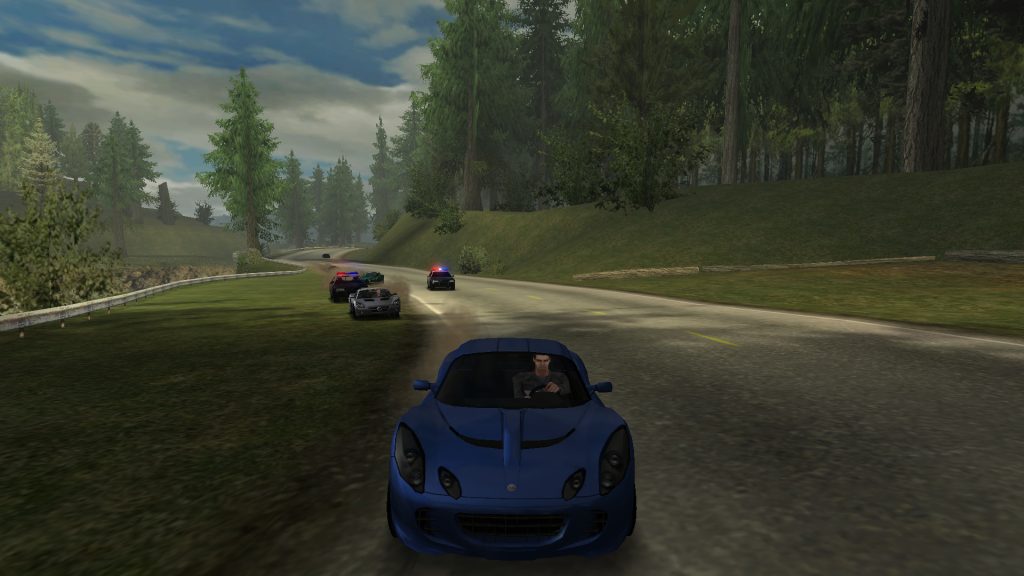 Zrzut ekranu z Need for Speed: Hot Pursuit 2 - pościg policyjny w trakcie wyścigu